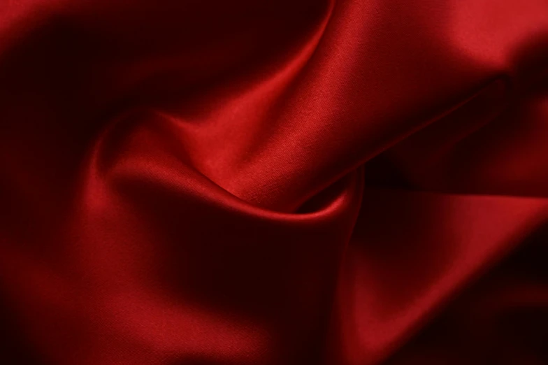 a close up of a red satin fabric