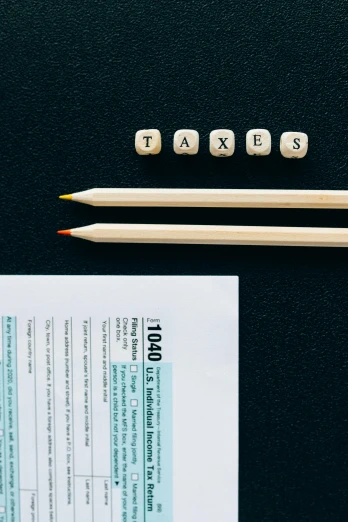 a pair of pencils sitting on top of a piece of paper, by Jason Felix, pexels contest winner, currency symbols printed, dices, taejune kim, instagram story