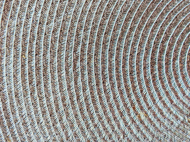 a close up of a woven table cloth, an ultrafine detailed painting, flickr, op art, copper patina, sprial, on textured disc base, very very very ultradetailed