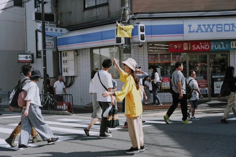 a group of people walking across a street, pexels contest winner, shin hanga, white and yellow scheme, 🚿🗝📝, convenience store, baggy clothing and hat