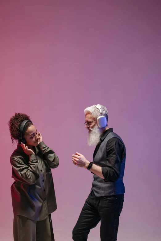 a couple of people standing next to each other, trending on unsplash, interactive art, wearing headphones, silver hair and beard, dance, 15081959 21121991 01012000 4k