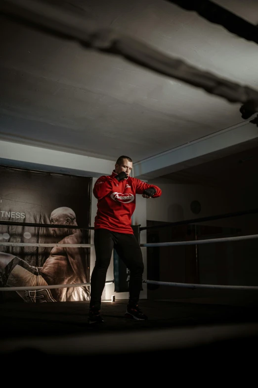 a man standing in the middle of a boxing ring, an album cover, by Ilya Ostroukhov, pexels contest winner, happening, in a gym, profile image, programming, instagram picture