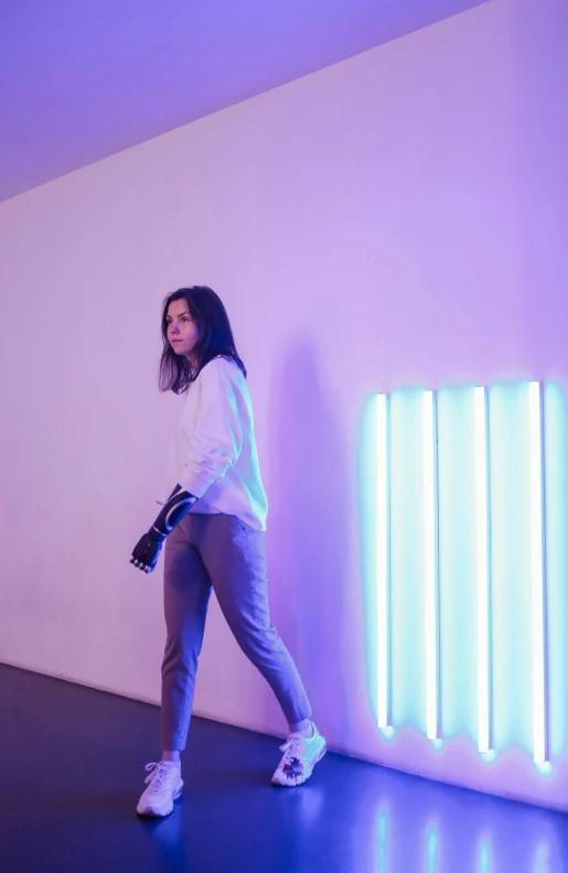 a woman that is standing in front of a radiator, inspired by Elsa Bleda, trending on unsplash, visual art, dan flavin, walking to the right, streetwear, pastel lighting