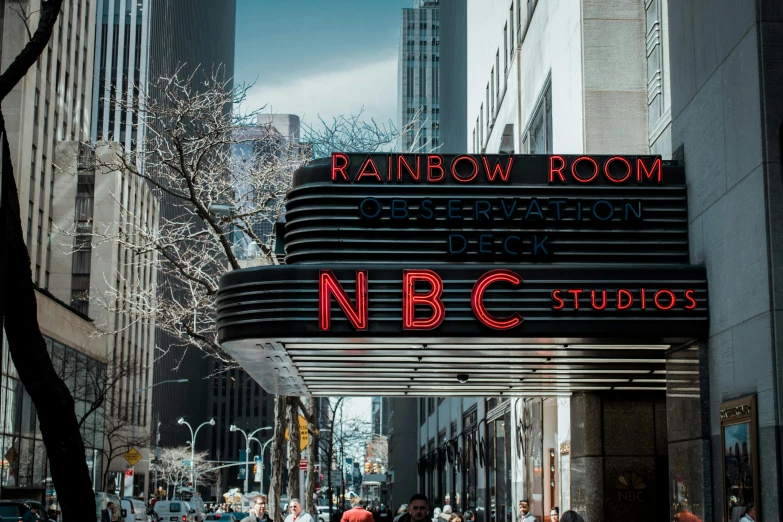 a crowd of people walking down a street next to a building, a cartoon, by Victor Noble Rainbird, instagram, hudson river school, netflix neon logo concept art, sitting on top of a rainbow, lightroom preset, nbc