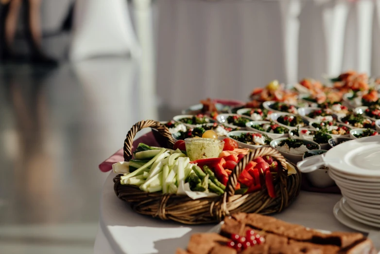 a table topped with lots of different types of food, by Carey Morris, pexels contest winner, white tablecloth, carrying a tray, [ cinematic, looking to the right