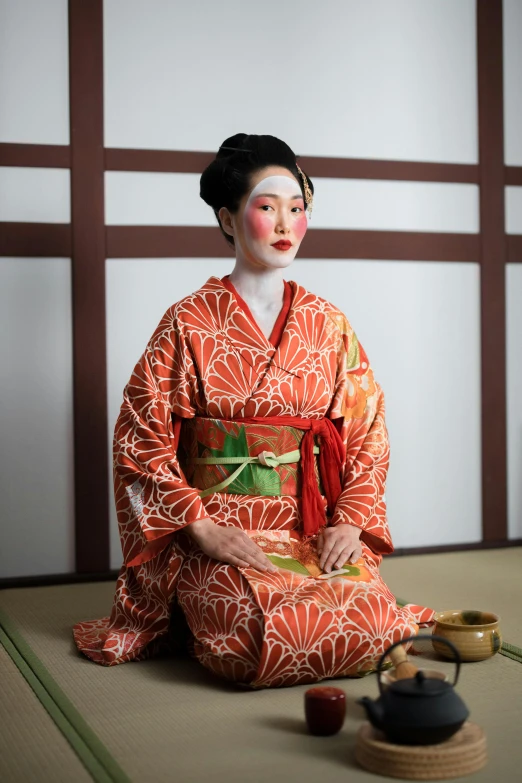 a woman in a kimono sitting on the floor, a portrait, inspired by Tosa Mitsunobu, trending on unsplash, square, ( ( theatrical ) ), wearing traditional garb, ornately dressed