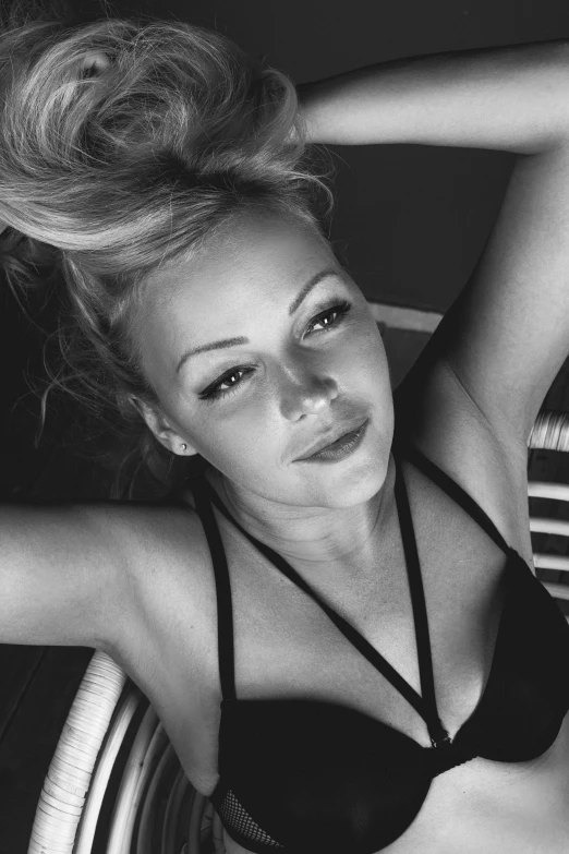 a black and white photo of a woman in a bikini, portrait of maci holloway, pianist, pamela anderson, avatar image