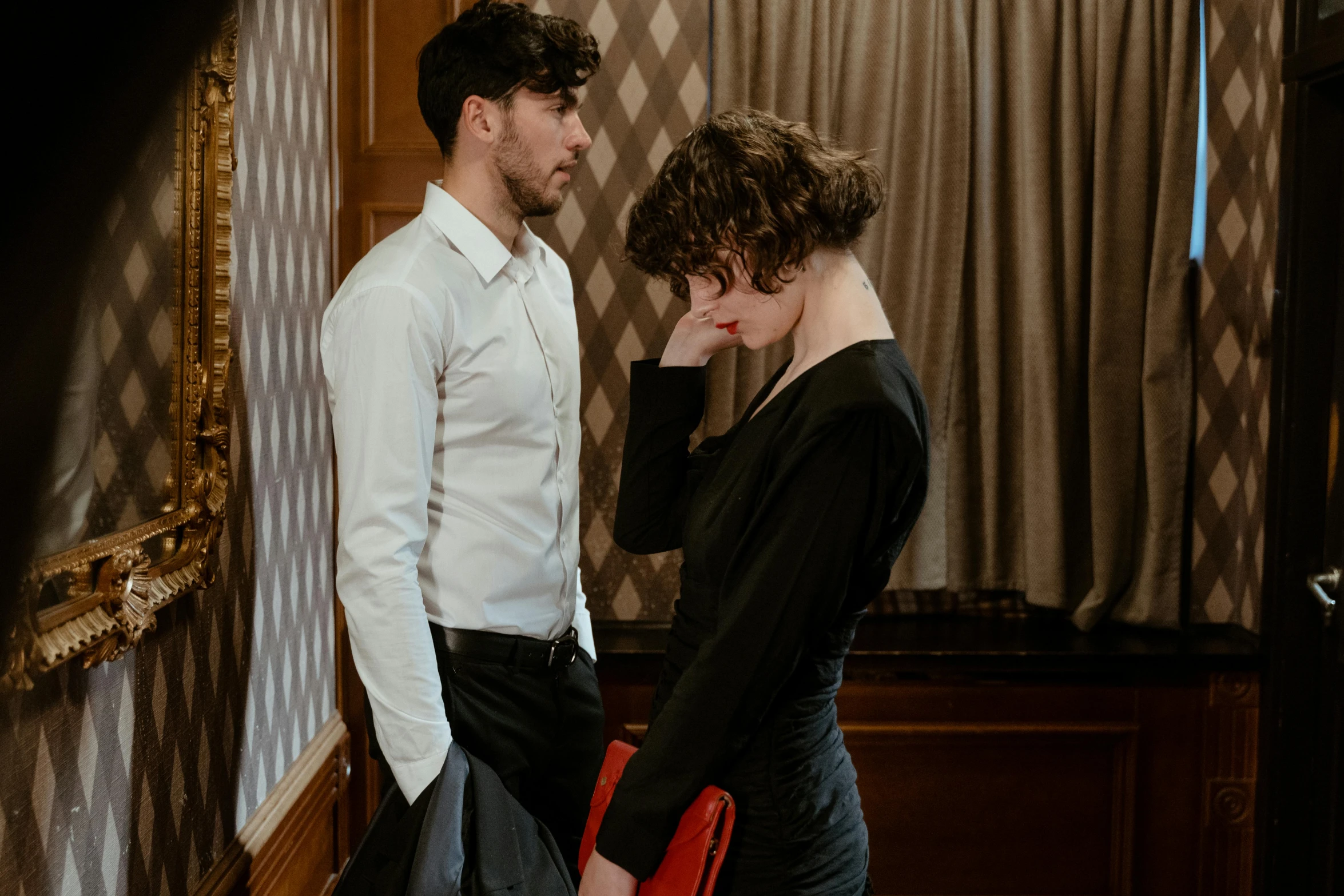 a man and a woman standing next to each other, pexels contest winner, renaissance, in style of nan goldin, frustrated, leaving a room, tailored clothing