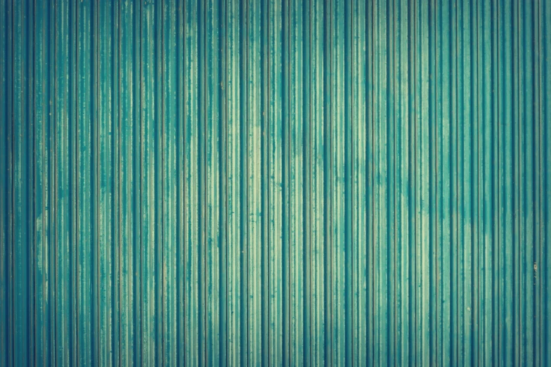 a close up of a blue corrugated wall, inspired by Andreas Gursky, trending on pixabay, vintage color photo, bamboo, greenish expired film, seamless texture