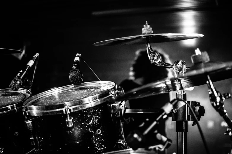 a black and white photo of a drum set, by Kristian Zahrtmann, pexels contest winner, 15081959 21121991 01012000 4k, featured, mouse with drum, live performance