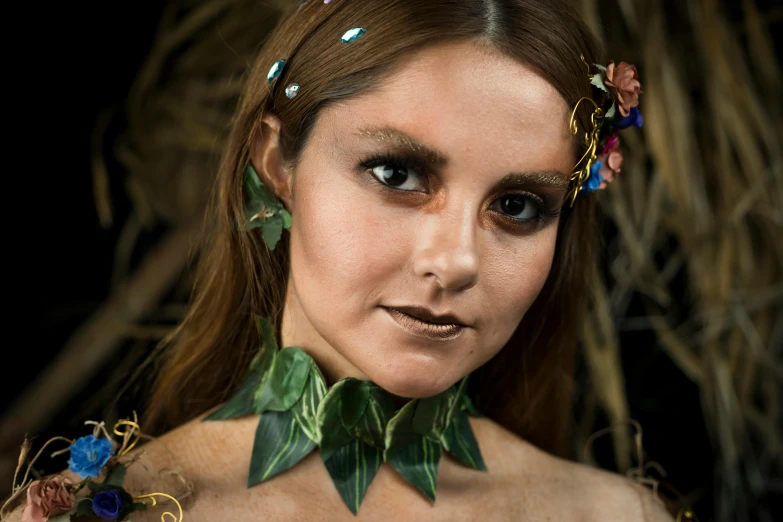 a close up of a person wearing a costume, inspired by Wendy Froud, trending on pexels, renaissance, emma stone poison ivy, cardboard, bone jewellery, dressed in laurel wreath