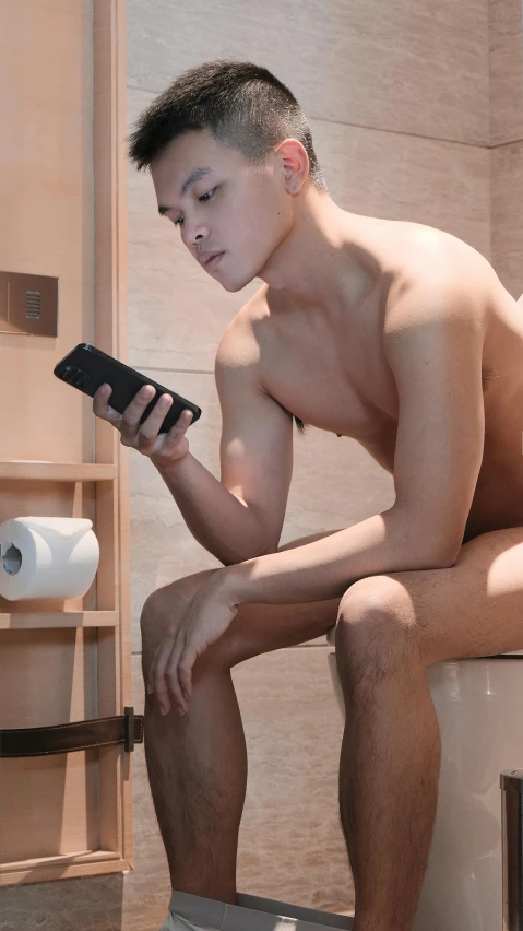 a man sitting on a toilet using a cell phone, shutterstock, conceptual art, disrobed, cai xukun, square, lgbt