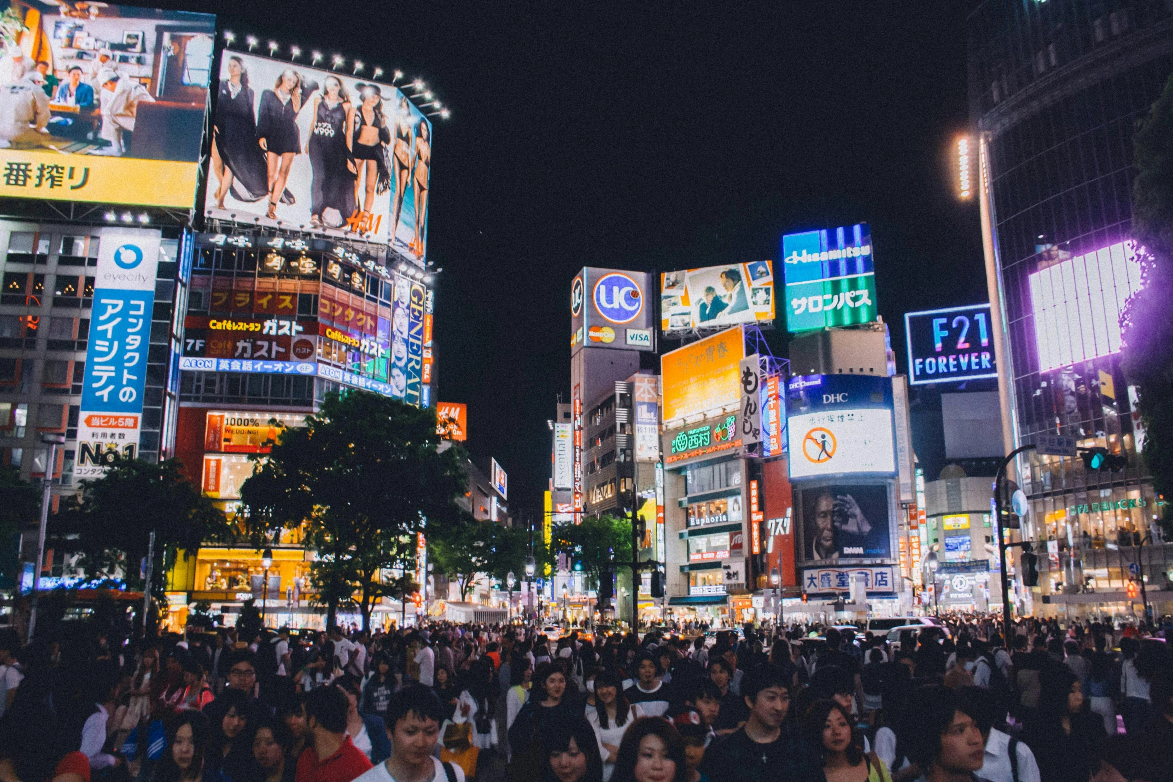 a crowd of people walking through a city at night, a photo, unsplash contest winner, ukiyo-e, neon electronic signs, square, round-cropped, beautiful city