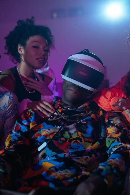 a group of people sitting on top of a bed, an album cover, inspired by Zhu Da, trending on pexels, afrofuturism, wearing vr goggles, still frame from a movie, headphones on his head, sassy pose