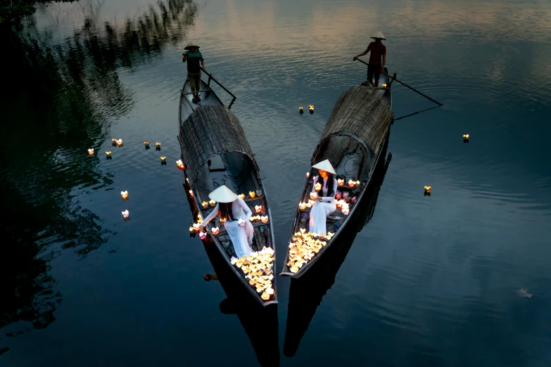 a couple of boats that are sitting in the water, inspired by Steve McCurry, unsplash contest winner, conceptual art, floating candles, ao dai, ceremony, epic lighting from above