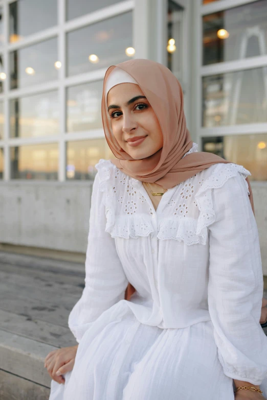 a woman in a white dress sitting on a bench, inspired by Maryam Hashemi, pexels contest winner, hurufiyya, halfbody headshot, cream colored blouse, multilayered outfit, on white