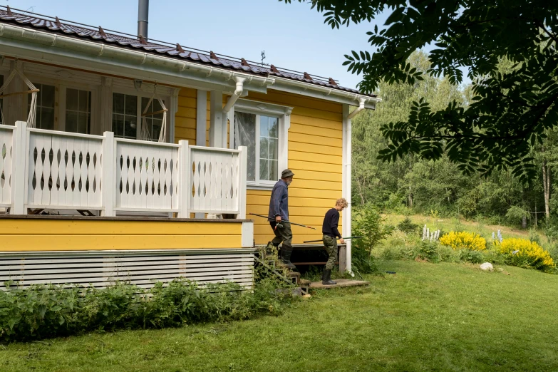 a couple of men standing outside of a yellow house, a picture, by Eero Järnefelt, unsplash, plein air, cottage, avatar image, maintenance photo, panoramic shot