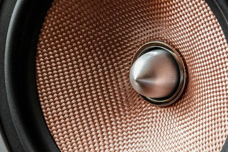 a close up of the inside of a speaker, by Thomas Häfner, unsplash, copper and brass, 8k fabric texture details, spherical lens, stainless steal