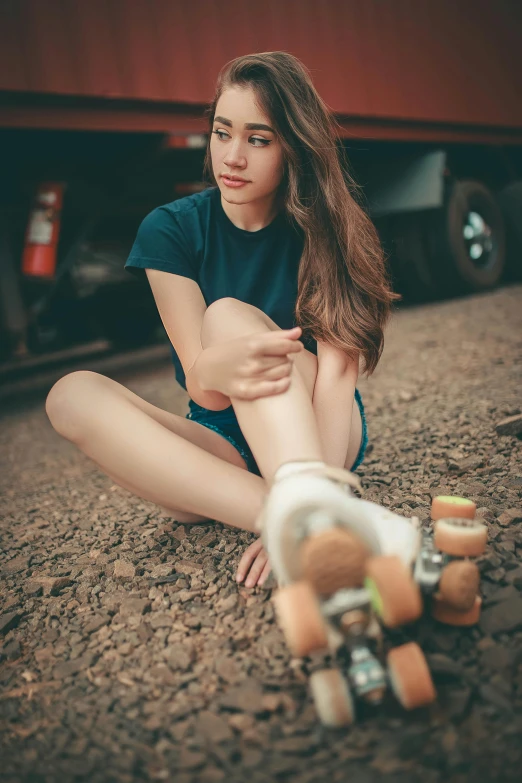 a woman sitting on the ground next to a train, inspired by Elsa Bleda, pexels contest winner, renaissance, at a skate park, pretty face with arms and legs, 15081959 21121991 01012000 4k, portrait sophie mudd