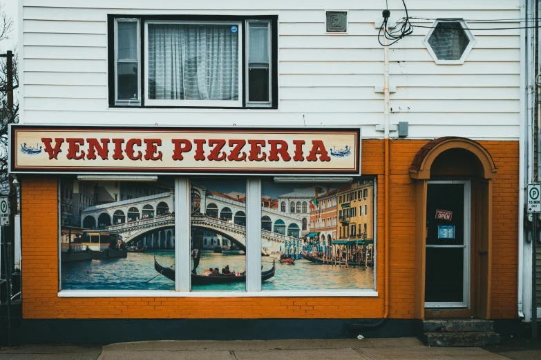 a picture of venice pizzaria on the side of a building, a photo, by Nick Fudge, pexels contest winner, 2 5 6 x 2 5 6 pixels, convenience store, toronto, nina masic