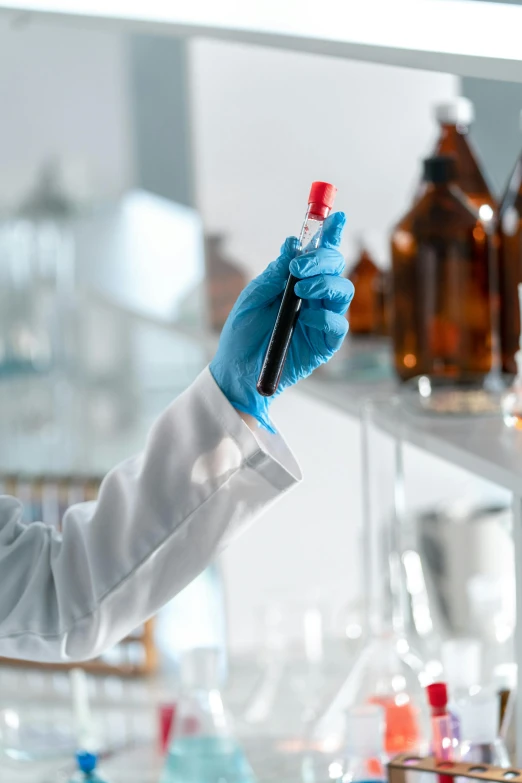 a woman in a lab coat holding a test tube, a picture, shutterstock, analytical art, red brown and blue color scheme, gloves on hands, holding a bottle of arak, beautiful surroundings