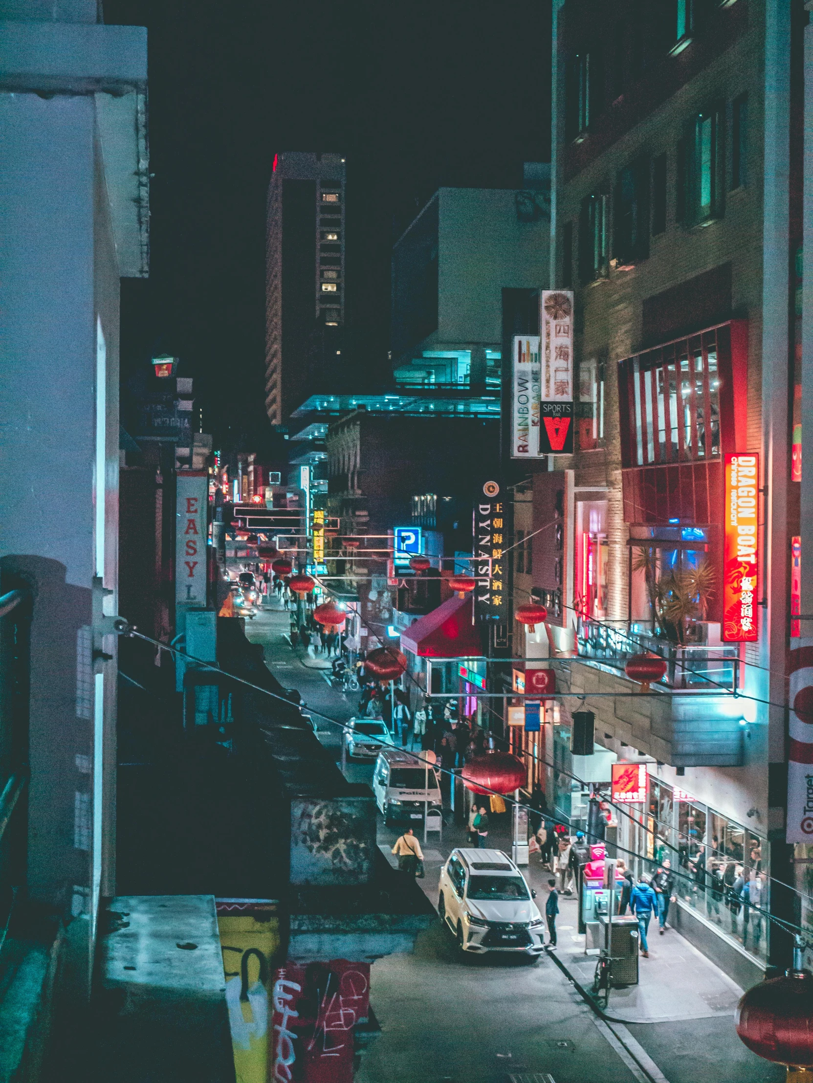 a city street filled with lots of traffic at night, inspired by Elsa Bleda, pexels contest winner, japanese downtown, snapchat photo, japanese neon signs, ominous beautiful mood