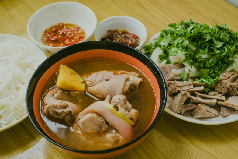 a bowl of soup sitting on top of a wooden table, inspired by Tan Ting-pho, chicken, high quality image”, profile image, cai xukun