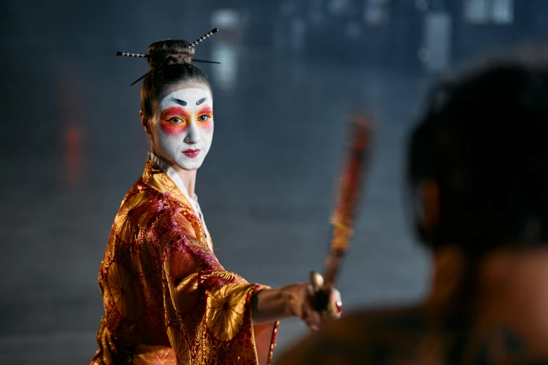 a woman dressed as a geisha holding a sword, pexels contest winner, 3 actors on stage, reflecting, on location, avatar image