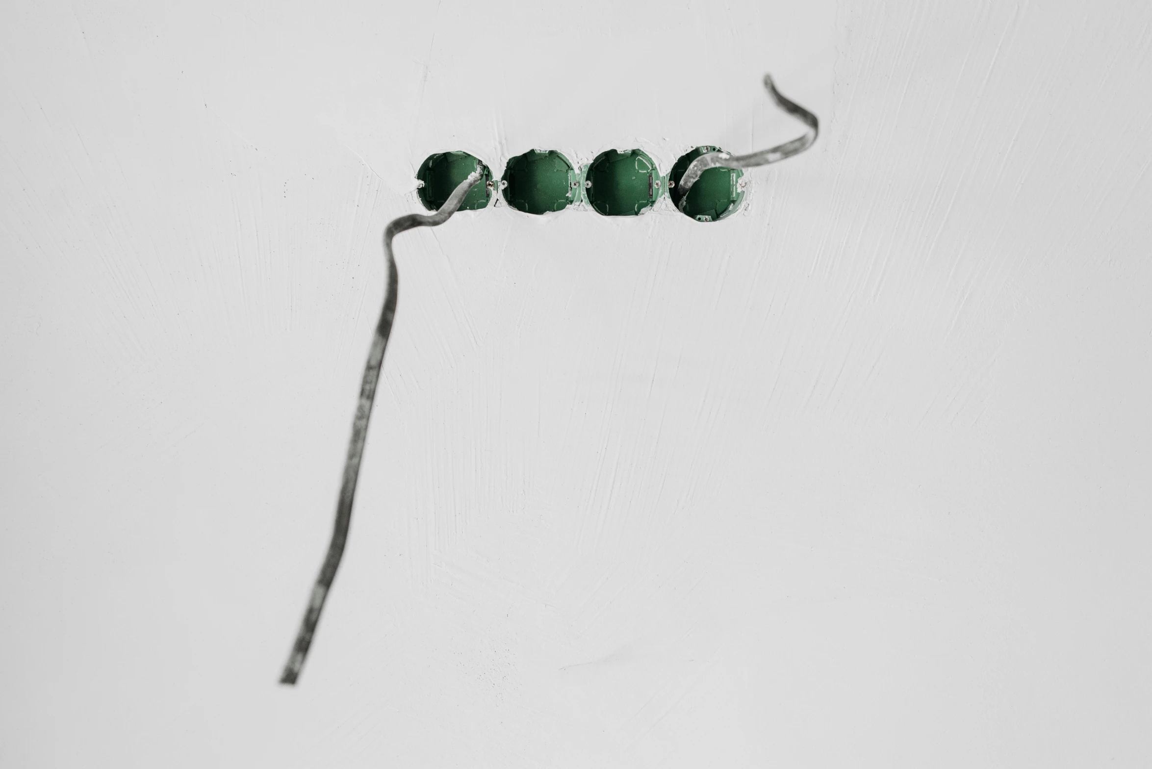 a pair of scissors sitting on top of a piece of paper, raw malachite, nadav kander, beads, 15 mm