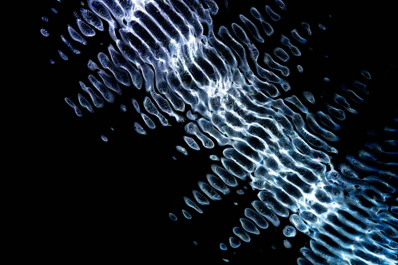 a close up of a cell phone on a black background, a microscopic photo, by Alison Watt, generative art, water ripples, arca album cover, hyperdetailed crisp render, motion lines