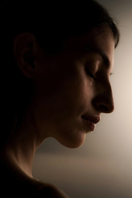 a close up of a person holding a cell phone, by Eglon van der Neer, pexels contest winner, digital art, backlit beautiful face, figure meditating close shot, portrait of a woman sleeping, profile portrait