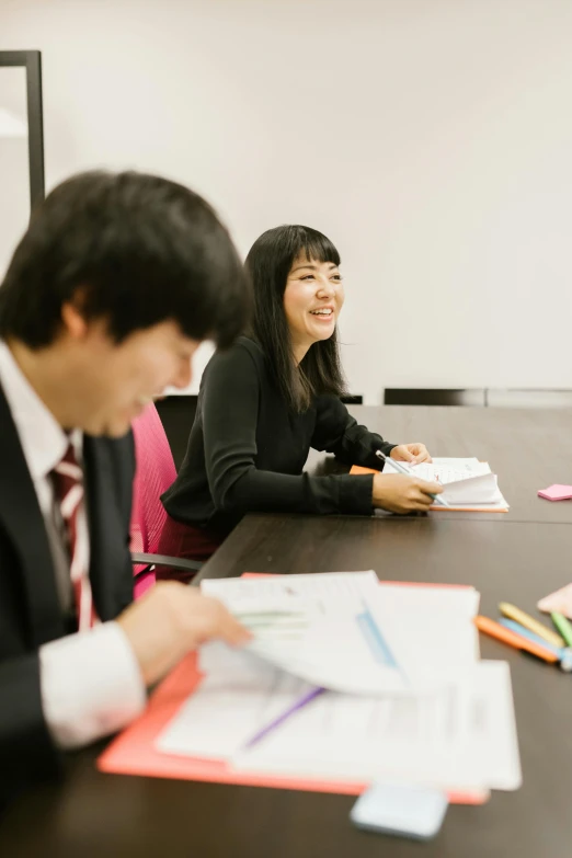 a group of people sitting around a conference table, by Aguri Uchida, sitting in the classroom, 2 people, student, 奈良美智