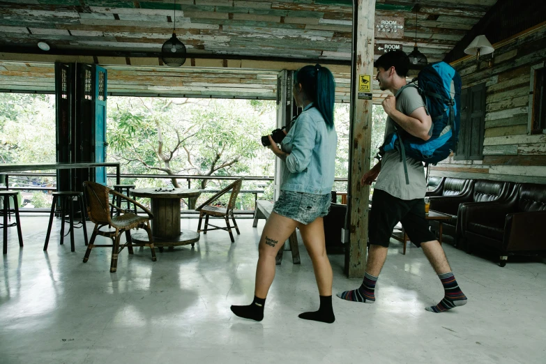 a couple of people that are walking in a room, cottage hippie naturalist, gemma chen, trecking, open plan