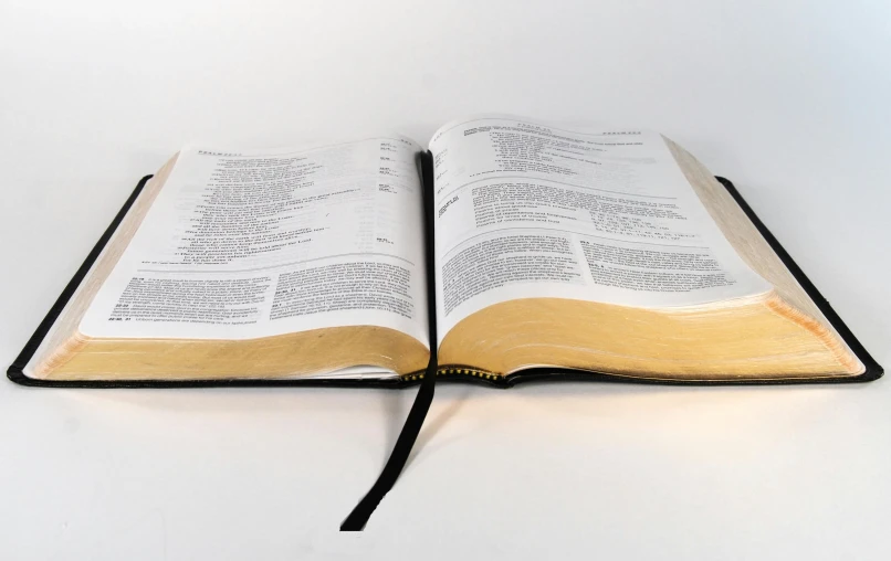 an open book sitting on top of a table