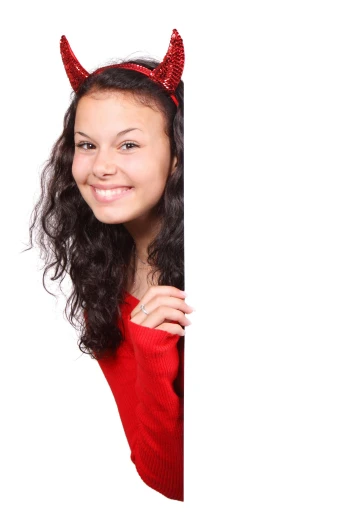 a girl in a devil costume peeking behind a wall, an album cover, shutterstock contest winner, renaissance, cardboard cutout, professional photo-n 3, teenager girl, holiday