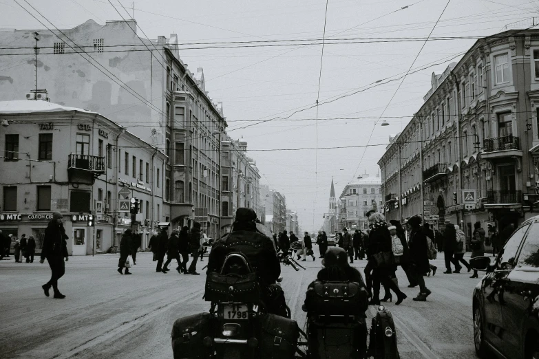 a black and white photo of people walking down a street, by Tamas Galambos, pexels contest winner, motorbike, saint petersburg, winter, old comics in city