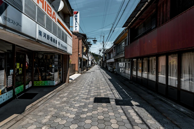 a narrow street lined with shops next to tall buildings, unsplash, shin hanga, in karuizawa, deserted, けもの, covid