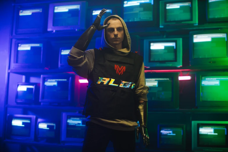 a man standing in front of a wall of televisions, cyberpunk art, unsplash contest winner, model is wearing techtical vest, shaco from league of legends, pete davidson, holding a milkor mgl