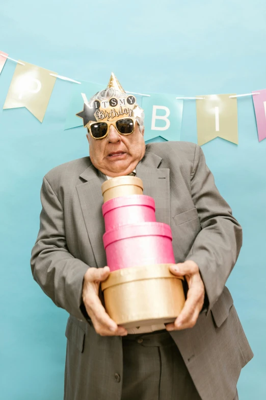 a man in a suit holding a birthday cake, an album cover, pexels contest winner, grandfatherly, party hats, obese ), shades