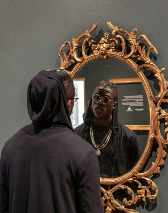 a man looking at himself in a mirror, an album cover, pexels contest winner, visual art, 2 chainz, museum curator, black art, kevin hart