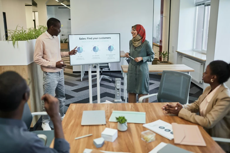 a group of people sitting around a wooden table, a cartoon, pexels contest winner, hurufiyya, giving a speech, in an office, whiteboards, sustainable materials