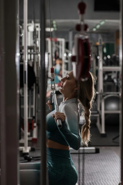 a woman is working out in the gym, by Emma Andijewska, profile image, two hang, multiple stories, 1614572159