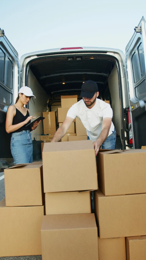 a man and woman unloading boxes from a moving truck, shutterstock, square, etsy, technology, black