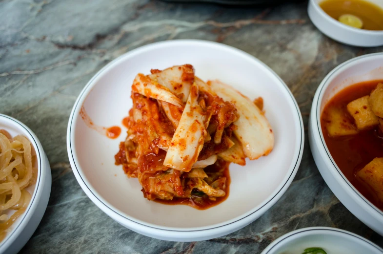 a close up of a plate of food on a table, sangsoo jeong, square, soaked, background image