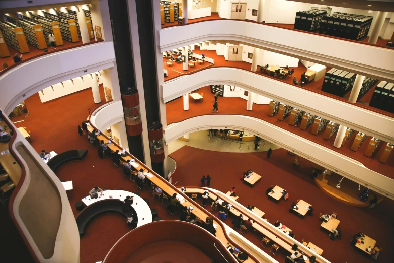 a large library filled with lots of books, pexels contest winner, figuration libre, red brown and white color scheme, melbourne, rotunda, floor b2