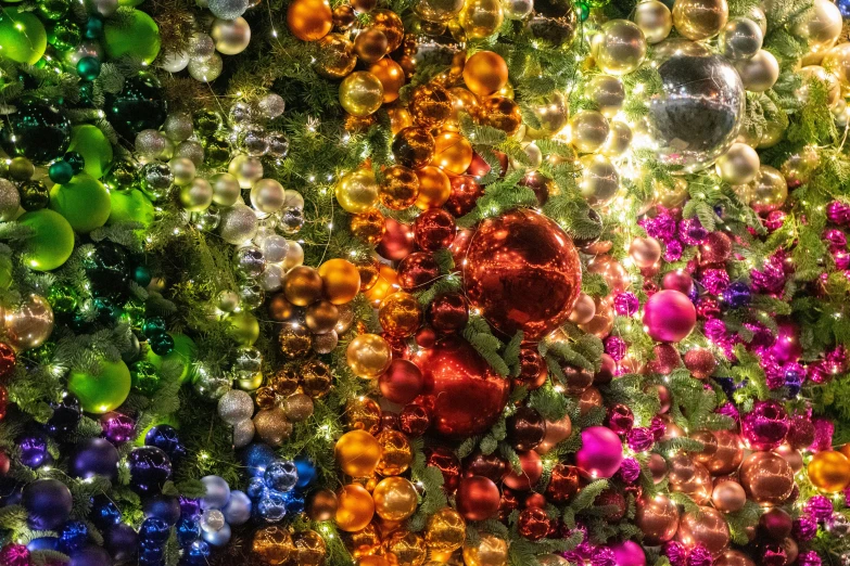 a bunch of christmas ornaments hanging on a wall, by Jan Rustem, pexels, maximalism, many rainbow bubbles, lush tress made of city lights, color ( sony a 7 r iv, high detailed colors