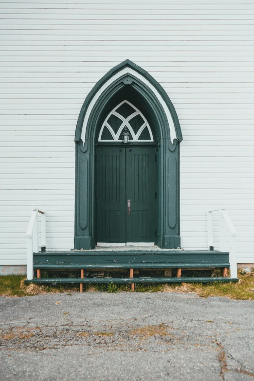 a green door in front of a white building, standing inside of a church, cottagecore, gothic revival, multi-part