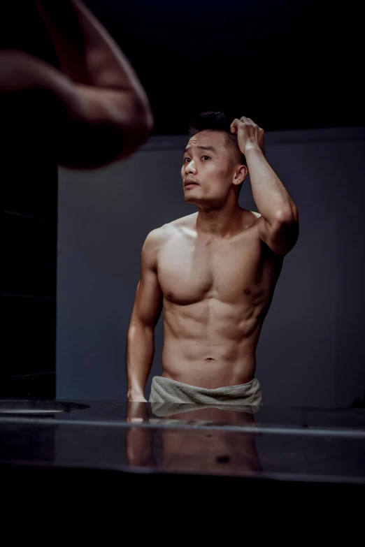 a shirtless man standing in front of a mirror, inspired by Fei Danxu, spotlight, profile photo, meet the actor behind the scenes, [ realistic photography ]