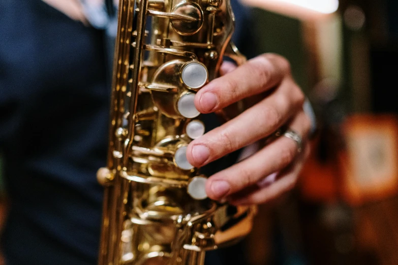 a close up of a person holding a saxophone, trending on pexels, 15081959 21121991 01012000 4k, instagram post, sydney hanson, thumbnail