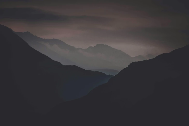 a black and white photo of a mountain range, inspired by Elsa Bleda, unsplash contest winner, tonalism, muted intense colors, sweet night ambient, instagram post, soft dark muted colors